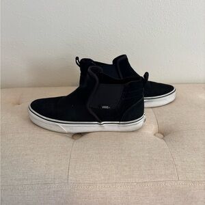 Vans women’s Black High-Top Sneakers